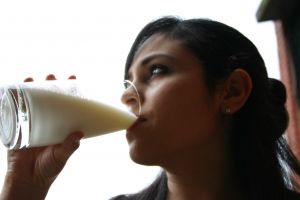 Woman Drinking A Glass Of Milk Woman Drinking A Glass Of Milk