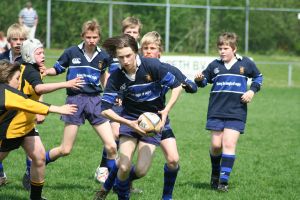 children playing football soccer rugby